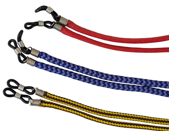 A collection of four reading glasses cords in different colors: red, blue, yellow, and multicolored, displayed on a white background.