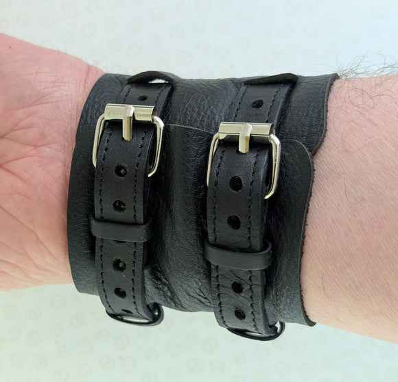 Black leather wriist strap with ywo buckles